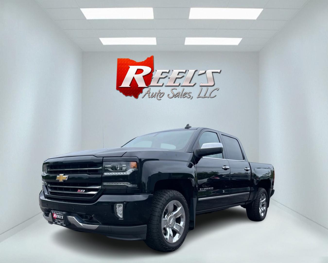 2018 Black /Black Chevrolet Silverado 1500 LTZ Z71 Crew Cab 4WD (3GCUKSEC4JG) with an 5.3L V8 OHV 16V engine, 8-Speed Automatic transmission, located at 547 E. Main St., Orwell, OH, 44076, (440) 437-5893, 41.535435, -80.847855 - This 2018 Chevrolet Silverado 1500 LTZ Z71 Crew Cab is a well-appointed and highly capable full-size pickup. It's powered by a 5.3L Vortec V8 engine paired with an 8-speed automatic transmission and 3.42 gearing, enabling an impressive 9,300-pound towing capacity. The Z71 off-road package includes f - Photo#0